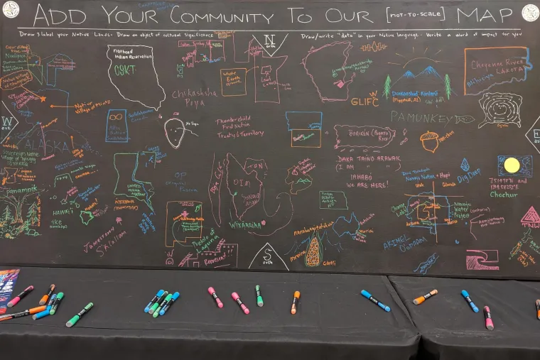 A chalkboard map invited attendees the chance to pay homage to their home communities.