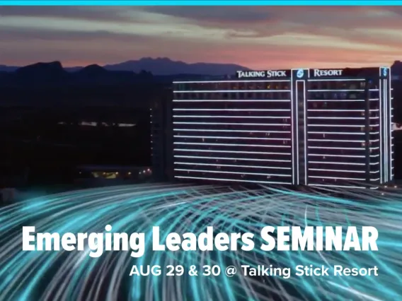 A time-lapse photo of lights streaming into Talking Stick Resort at sunset.