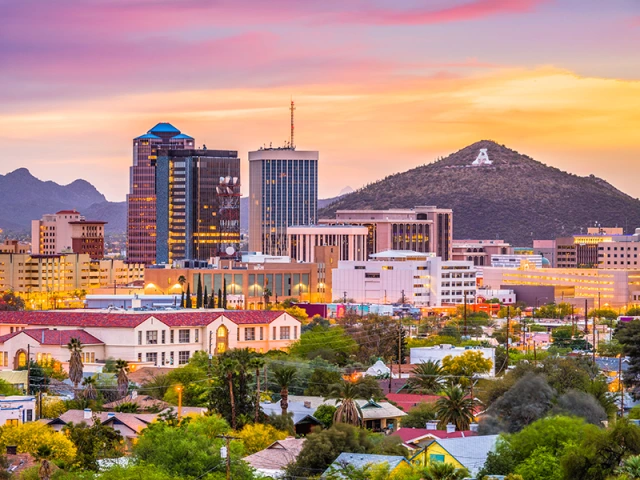 The downtownTucson skyline at sunset with A mountain in the background