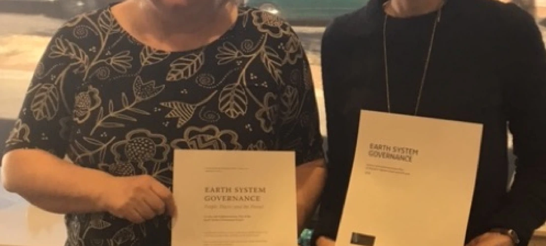 Drs. Liverman and Gerlak holding their respective ESG science plans