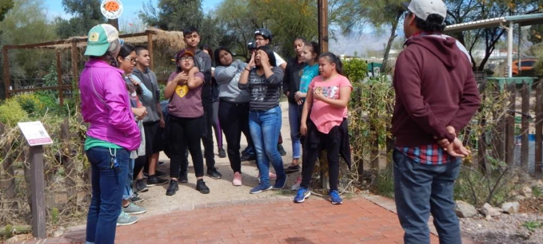 The group of students visited the Community Food Bank and learned about food production