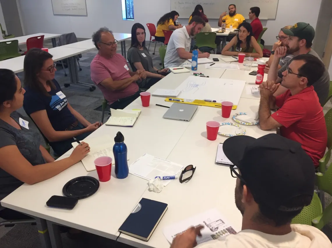 Figure 1. Green infrastructure team led by Joaquin Murrieta from Watershed Management Group plan their work during the Kickoff meeting.