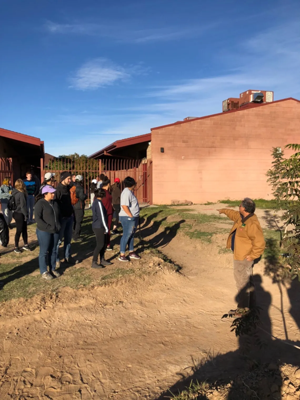 Figure 4: Volunteers receiving instructions from Joaquin Murrieta during the implementation event