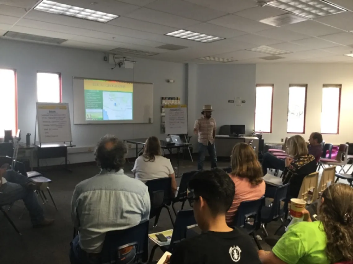 Luis Perales giving a talk at the Visioning Event