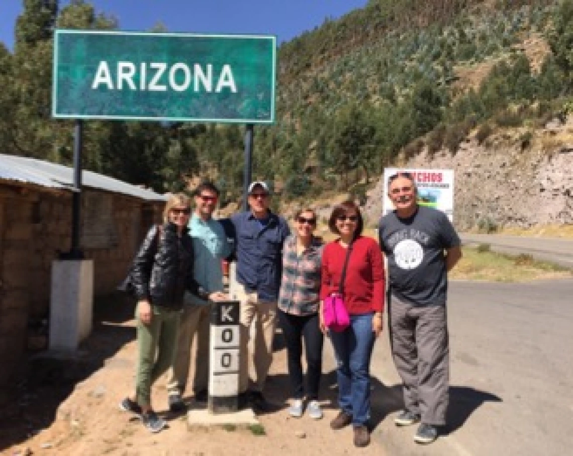 UA Researchers at the entrance to the town of Arizona, Peru, an hour south of Ayacucho (from L to R, Andrea Gerlak, Adam Henry, Christopher Scott, Emily Bell, Adriana Zuniga, Robert Varady). Photo by C. Staddon.