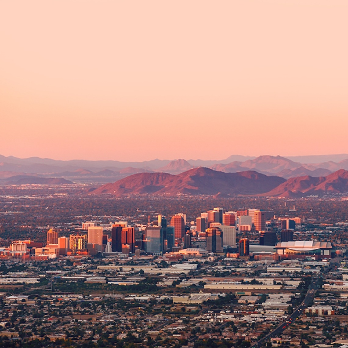 An aerial photo of the City of Phoenix at sunset.