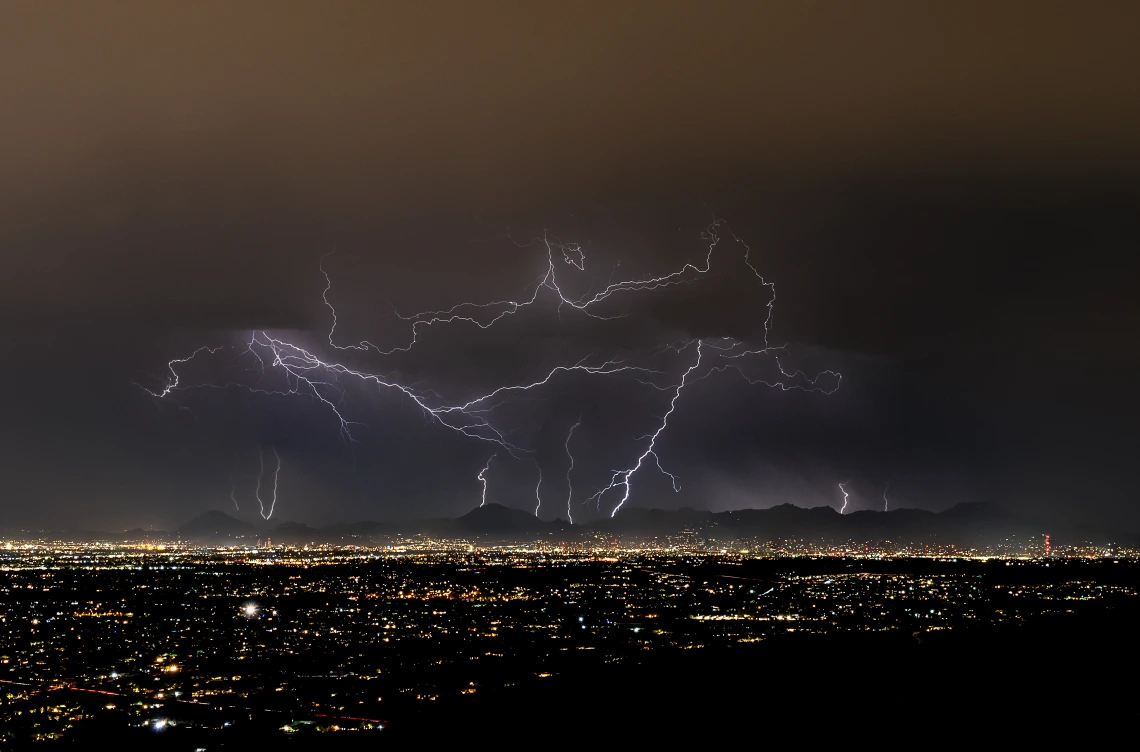 lightening and monsoon storm clouds over Tucson at night