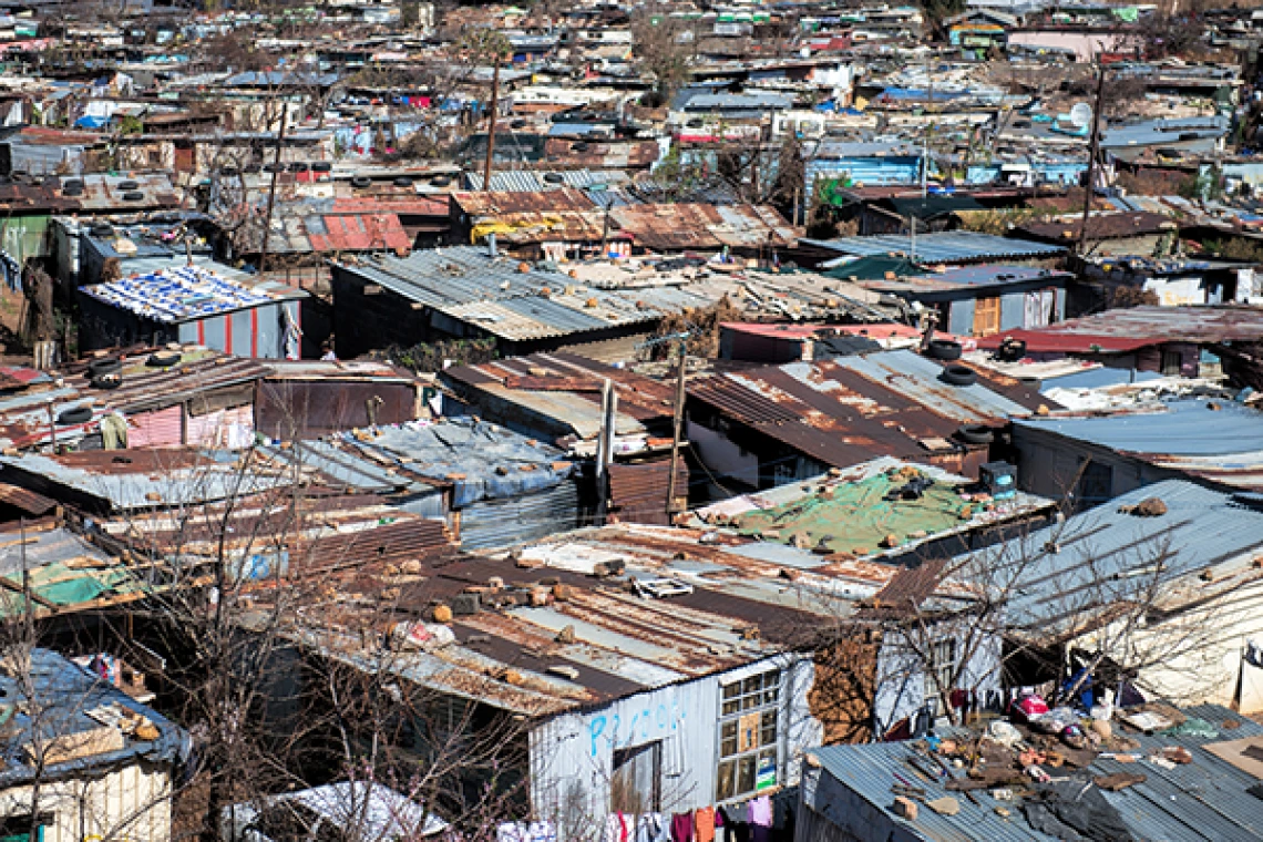 aerial view of a  crowded shanty town