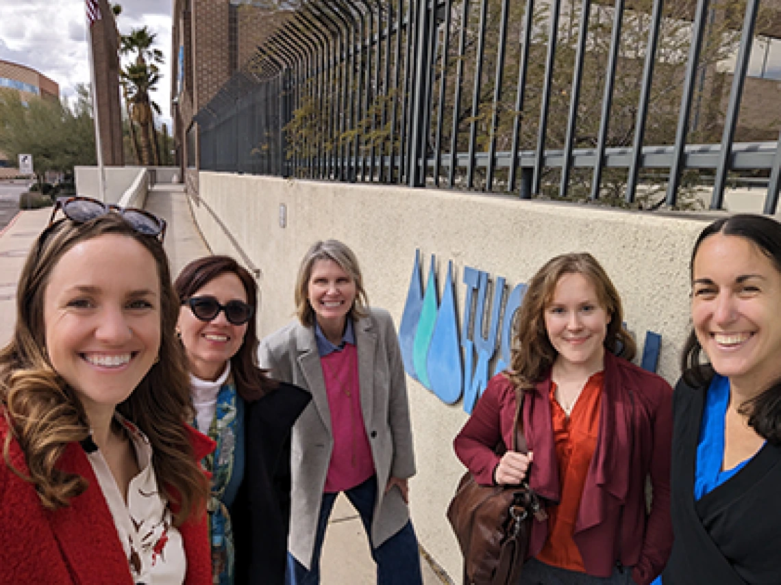 Udall Center researchers pose for a group selfie outside of the Tucson Water building.