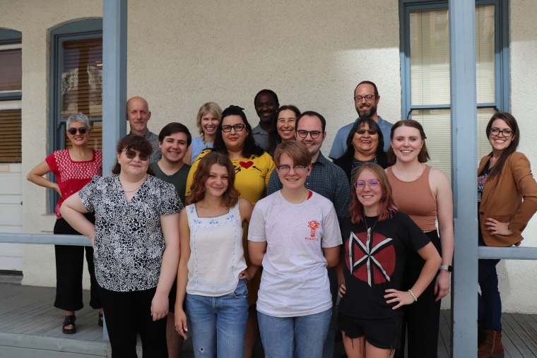 Scholars and mentors pose together on the steps of the Udall Center building during a program reception in late August.