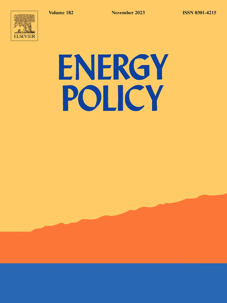 This cover of Energy Policy features a simplified landscape in which the sky is yellow, the horizon is orange and a stripe of blue at the bottom represents water. The journal name is featured in blue block text.