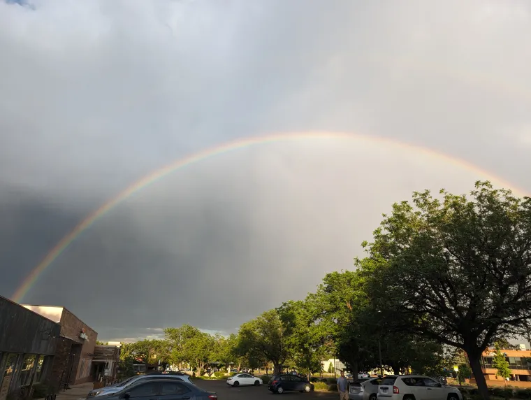 A rainbow appears over the UC Boulder campus during the 2024 GWC Conference.