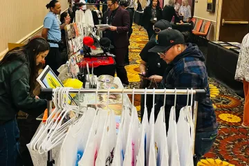 Summit-goers shop at the Indigenous artisan market.